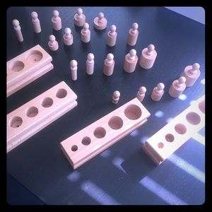 Montessori knobbed cylinders family set.